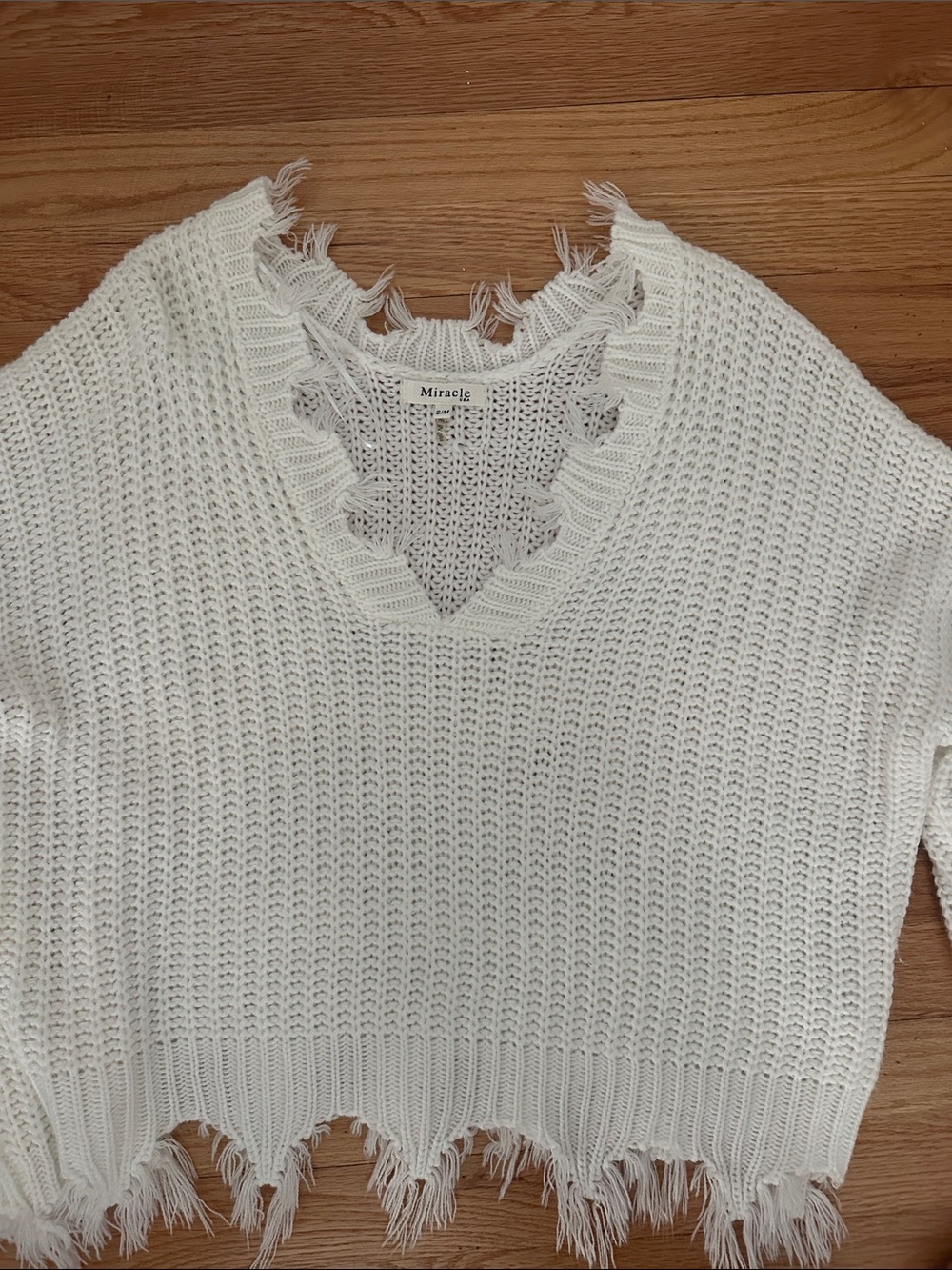Miracle Cream Distressed V-Neck Knit Sweater